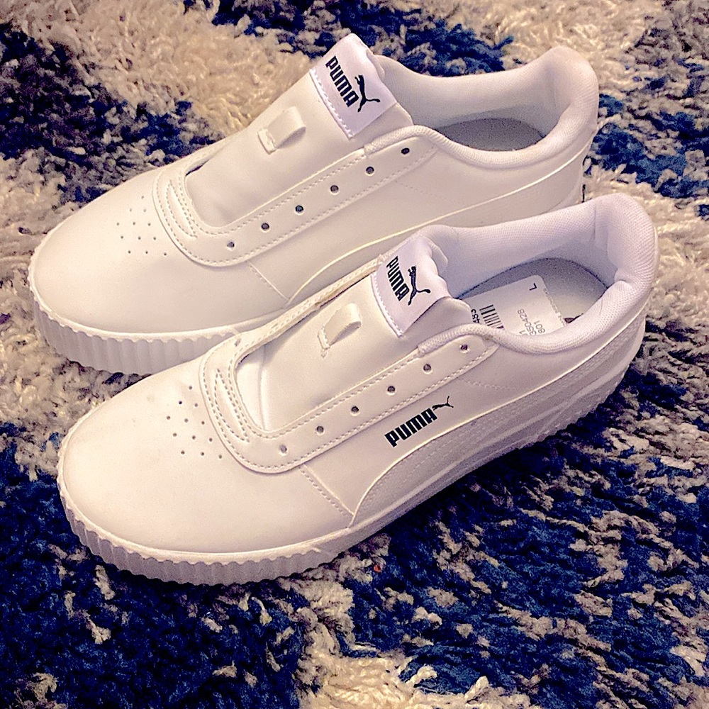 Puma, new w/out box women 9 white, comes w/ laces, no box